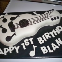 Guitar Cake this cake is all fondant with icing strings