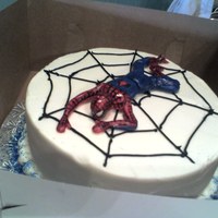 Spiderman Topper Spiderman topper modeled using human body mold and then positioned for the crawling pose. Hand painted suit colors and details.