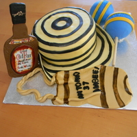Colombian Cake sombrero vueltiao tipical hat from colombia qith a whisky bottle, a mochila and maracas