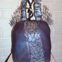 Nightmare Before Christmas Jack is gumpaste, fence and moon is piped royal icing, gate is RK coved in fondant, 3 8" covered in fondant