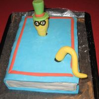 Book Worm This was my VERY FIRST cake. I hadn't taken a class nor made anything with fondant EVER before. I became fascinated with cakes after...