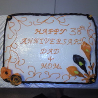 Anniversary Cake. my mom and dads anniversary cake...theirs is on Oct. 29 hence the halloween colors...first attempt at basket weave....