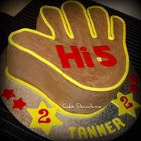 Hi 5 Giant Hand Cake This is a giant of a cake (it stands over 6 inches tal) - carved from 2 X 12 inch square rich chocolate mudcakes.Layered and coated with...