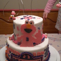 Girls Elmo Cake! my daughters 3rd birthday cake request! ELMO!! this was a challenge cause i had no idea where it was going, i think it turned out very well...