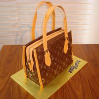 Lv Cake. This was the cake for my birthday , I made this cake because I love purses and specially this one. The funny thing was that when I finished...