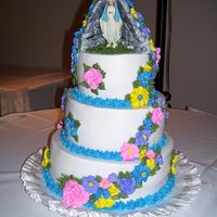 The Grotto Cake This cake was made for a catholic school fund raiser. It's the tallest cake I've made so far. The grotto was made with gumpaste,...