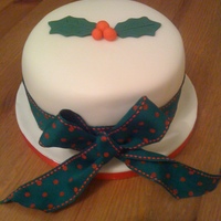 Christmas Cake 6" Fruit cake covered in marzipan and sugarpaste.