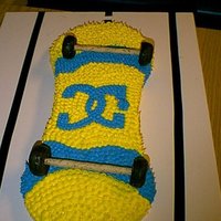 Skateboard BC frosted with chocolate donuts and cookies for wheels.