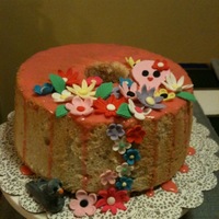 Angel Food Birthday Cake Sorry about the lighting! Vanilla bean angel food cake with maraschino cherry glaze and fondant flowers. That is a pigeon. The 14 year girl...