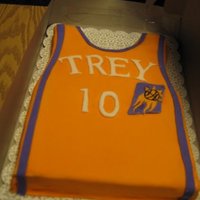 Sports Jersey Fondant covered cake with accents.