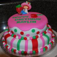 Strawberry Shortcake Birthday Cake Strawberry Shortcake themed birthday cake. Cake was white with white icing as filling.