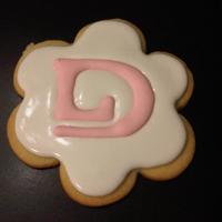 Danier Logo Cookie My first attempt at doing a flooded sugar cookie with royal icing. Lots of lessons learned; you can PM me for details. NFSC with Antonia74...