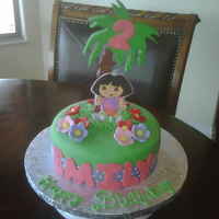 Dora Palm Tree vanilla cake with buttercream filling. Fondant accents. Palm tree is made of foam (not edible).