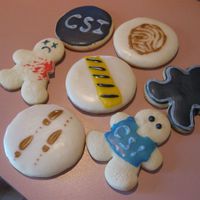 Csi Cookies Baked and iced these for a themed family party.