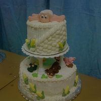 Wilton Course 3 Final Cake working with condant for all my animals and the corn cobs, I had a very hard time with it cracking and keeping its shape.