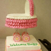 Baby Stroller A Wilton design. All buttercream. Gumpaste wheels.