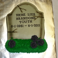 Here Lies Your Youth! buttercream icing, royal icing roses, fondant letters, and some airbrushing!