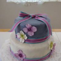 My 2Nd First Time Cake MM Fondant, ribbon and paper flowers. Thanks for looking