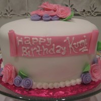Floral Birthday Cake Floral birthday cake. Cake covered in fondant, roses were made of fondant as well. TFL!