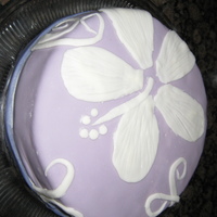 My Very First Cake Ever My first cake I ever made trying to use fondant. I used homemade MM Fondant for background and flower. Design was inspired by one of the...