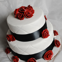 Roses & Ribbons Two tiers, 6" & 8". Cake was vanilla & filling was "pina colada" (Coconut cream & pineapples...nom-nom-nom...