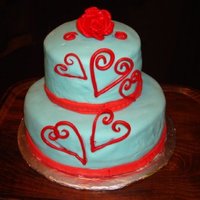 Red Hearts Cake My first ever fondant covered cake!Inspired by Alanahodgson's Hearts Cake: http://www.cakecentral.com/cake-photo_1250797.html My cake...