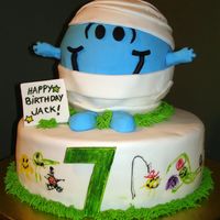 Mr. Bump This Mr. Bump birthday cake was a collaborative effort between my son and me. The bottom cake is a 10" chocolate round covered in...