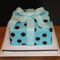 Polka Dot Gift Cake This cake was based on the adorable shower invites. Inside was three layers of vanilla sponge cake filled with a rich and creamy chocolate...