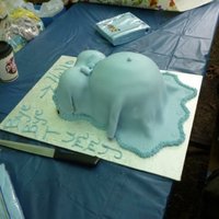 Belly Cake For My Niece's Baby Shower marble cake with strawberry fillinused betty crocker ball pan for belly and two oven proof small bowls for boobs...all on top of a carved...