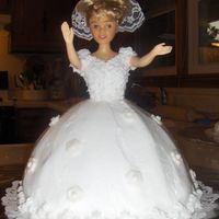 Bride Doll Cake I made this and four other "bride" cakes as centerpieces at a bridal shower. There were three "bridesmaids" surrounding...