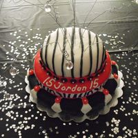 Jordan's Cake Hello! Made of fondant, icing, cake, wire, and jewels.