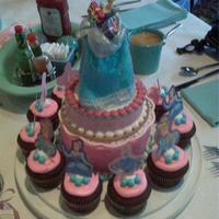 Cinderella Cake & Cupcakes I made this for my niece- we celebrated her 3rd bday at goofy's kitchen- she was dressed as Cinderella too...