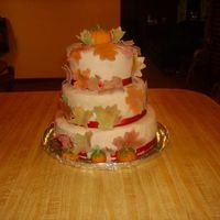 Fall Cake 3 tier, with fondant leaves and pumpkins.