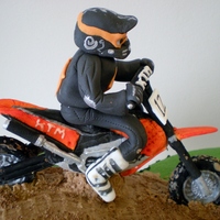 Crosser Bike crosser bike, all made out of sugar, bike is gelatine icing and the rider was modeling paste