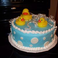 Ducky Cake white cake mix with buttercream icing. i wasn't happy with the top of the cake, at least it tasted good!