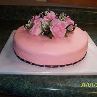 Mary Kay Debut Cake i made this for my mary kay debut. it is a white cake with buttercream icing. inside is filled with strawberries and strawberry gel....