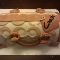 Coach Purse this is a coach purse that i hand carved out of a half sheet cake strawberry vanialle cake with buttercream with fondant and fondant...
