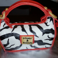 Dooney Bag French vanilla -almond cake buttercream icing homemade fondant Hand painted zebra stripes all fondant hope you like