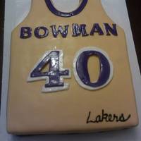 Lakers Jersey this was a half sheet cake i hand carved marble cake with buttercream and than coverd in fondant and the name and numbers are painted with...