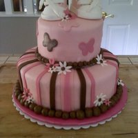 Baby Shoes My second baby shower cake! First time making the baby shoes. Let's just say I learned alot of what not to do!