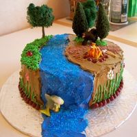 Camping Cake This was my first "scene" cake. The bear, fish and trees are from Michael's. The rest is edible. It was a 2-layer 8"...