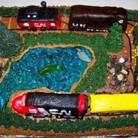 Model Train Cake This was made for a gentleman celebrating the completion of his model railway. My fondant work is a little iffy and it took HOURS to carve...