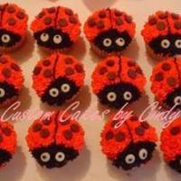 Lady Bug Cupcakes inspired by all the wonderful lady bug cakes and cupcakes on cc. the dots are chocolate chips and the eyes are white chocolate chips, the...