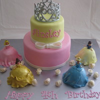 My Daughter's Princess Cake Gumpaste tiara airbrushed silver. Everything else is MMF, except for store bought dolls.