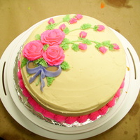 First Rose Cake! This is my favorite first time cake, golden vanilla cake with raspberry filling, and butter cream frosting. :)