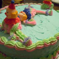 Clown Cake... Before the class, this iced cake fell out of the container onto the floor and after decorating it, on the way home it had another nice ride...