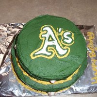 Oakland A's Cake White cake with vanilla butter cream. Oakland A's theme. I did the logo free hand.