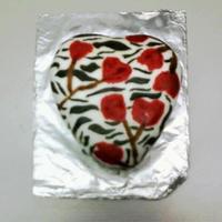 Zebra Cake Mini heart shaped cake with white fondant, flowers and zebra print draen by hand