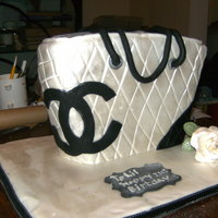 Chanel Bag silver and black chanel bag.madiera sponge cake with chocolate buttercream filling for the 21st birthday girl.TFL