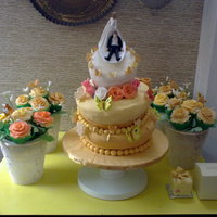 Topsy Turvy first wedding cake i've ever made....with a handmade centerpieces(cupcakes)and favours to take home..lots of work and fun...TFL